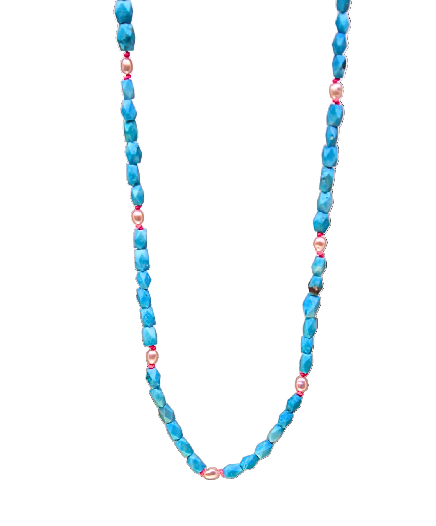 A necklace with blue faceted turquoise and creamy freshwater pearls, strung together on a silk cord.